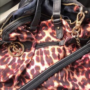 Juicy couture purse. Still in decent condition.
